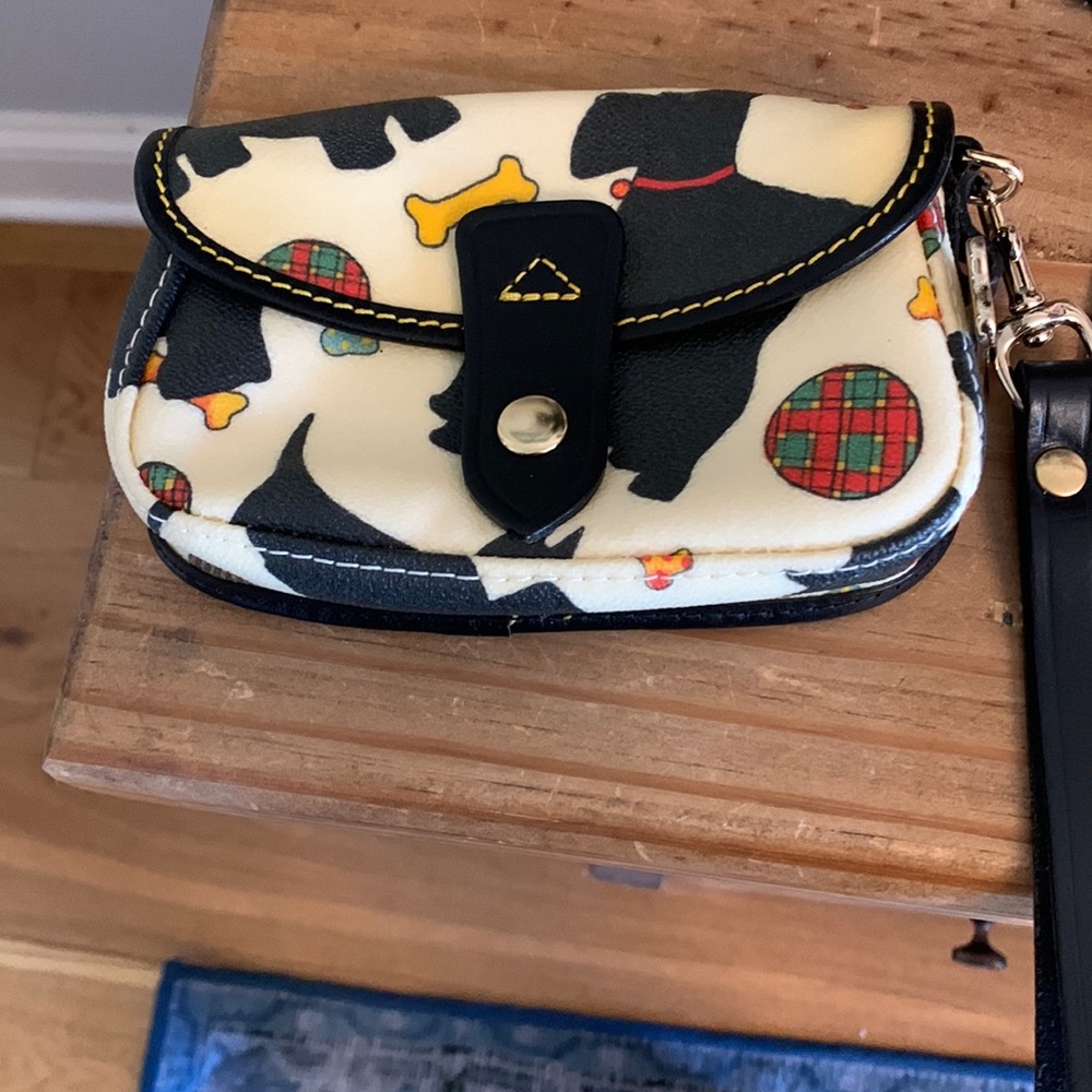 Dooney and Bourke Scotty dog wristlet. Like new